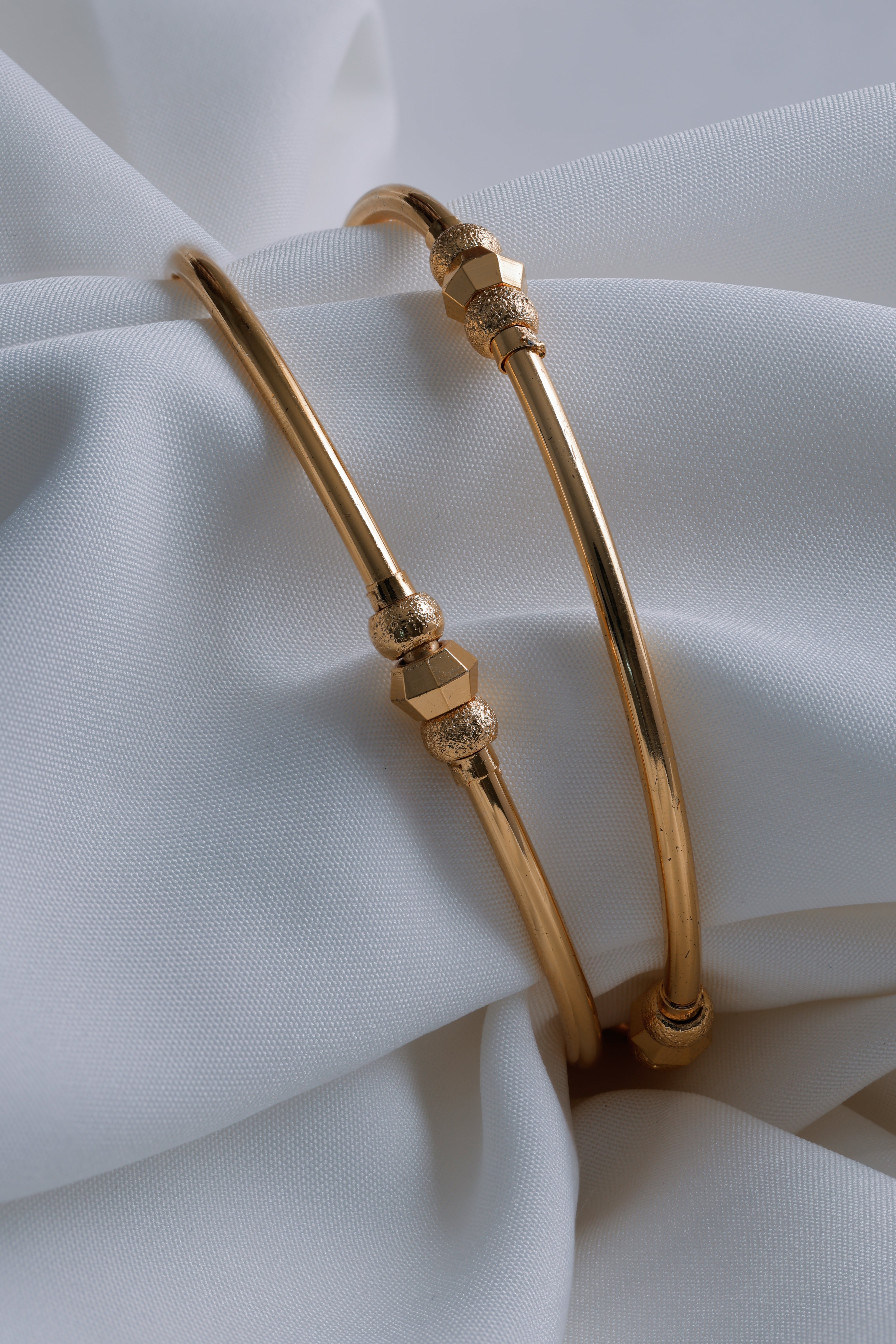 Timeless Radiance: Gold-Plated Slim Beaded Bangles (Set of 2)