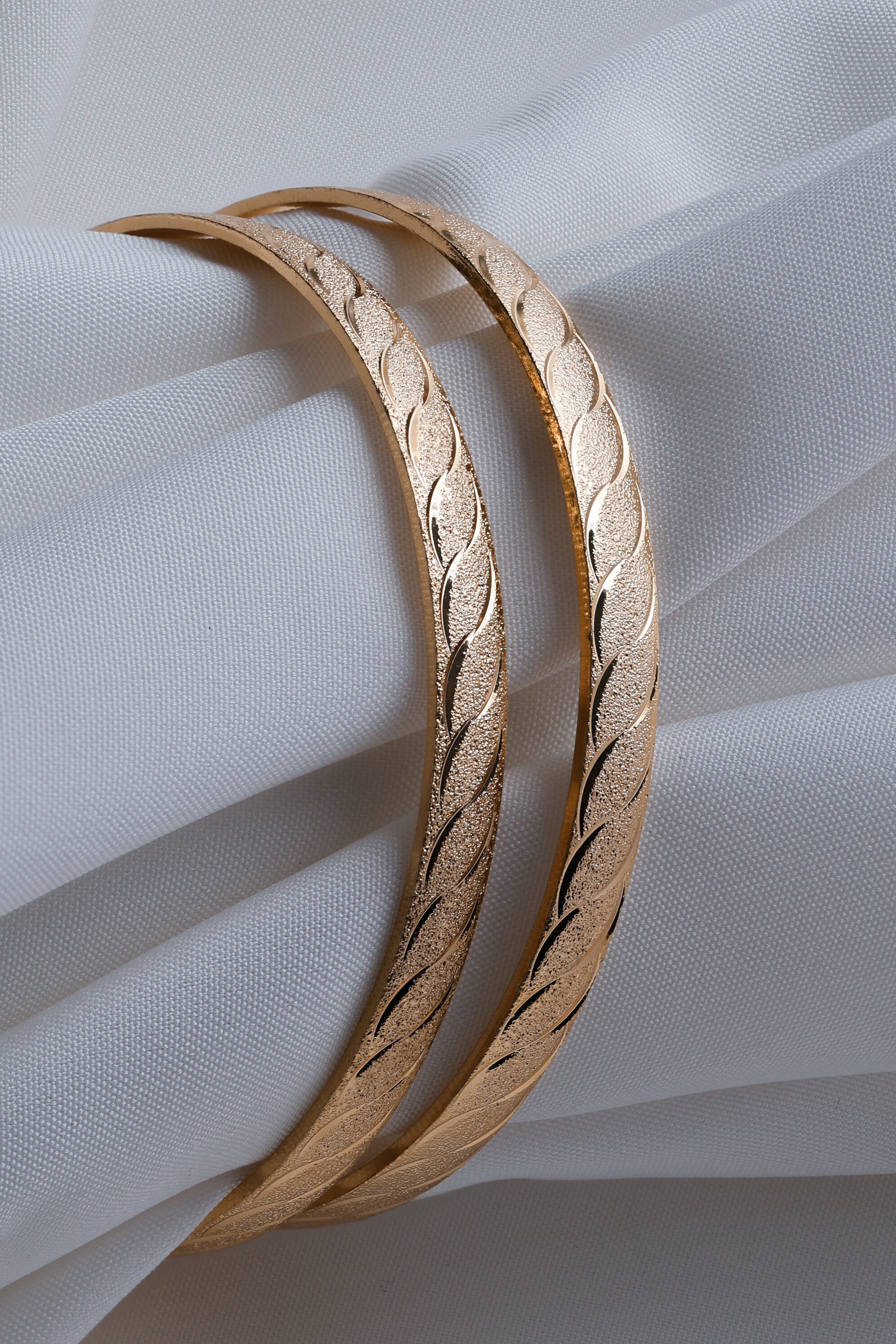 Gold-Toned Waves of Elegance: Dual-Texture Precision- Etched Bangles ( Set of 2)