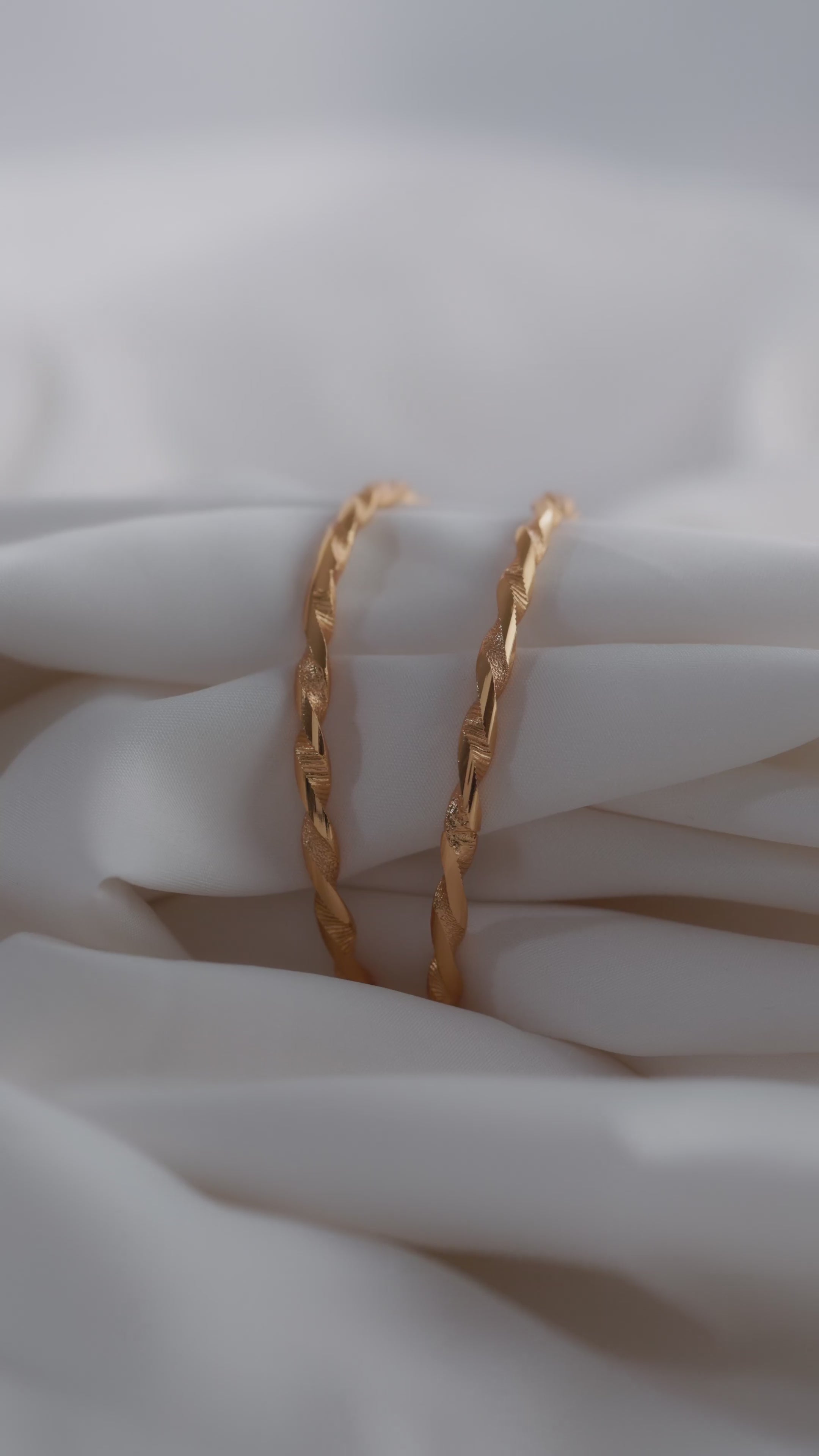 Elegant Twisted Ribbon Gold-Plated Bangles (Set of 2)