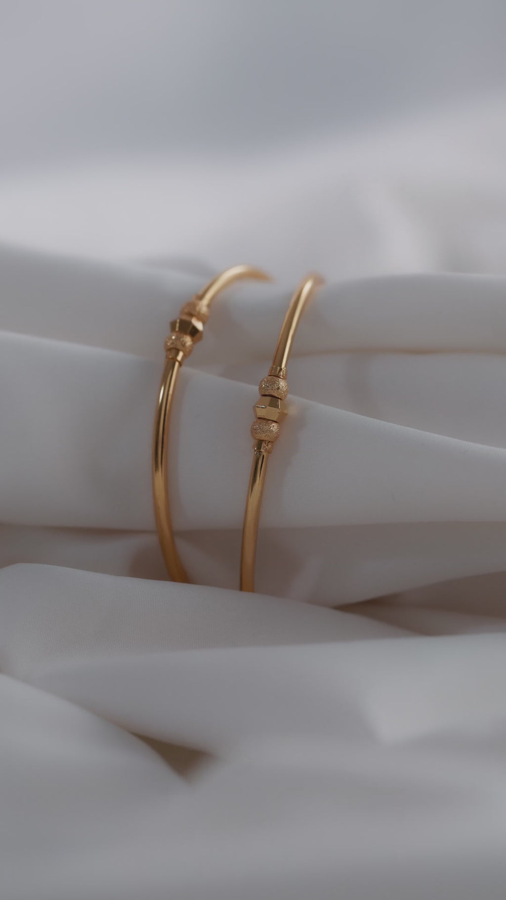 Timeless Radiance: Gold-Plated Slim Beaded Bangles (Set of 2)