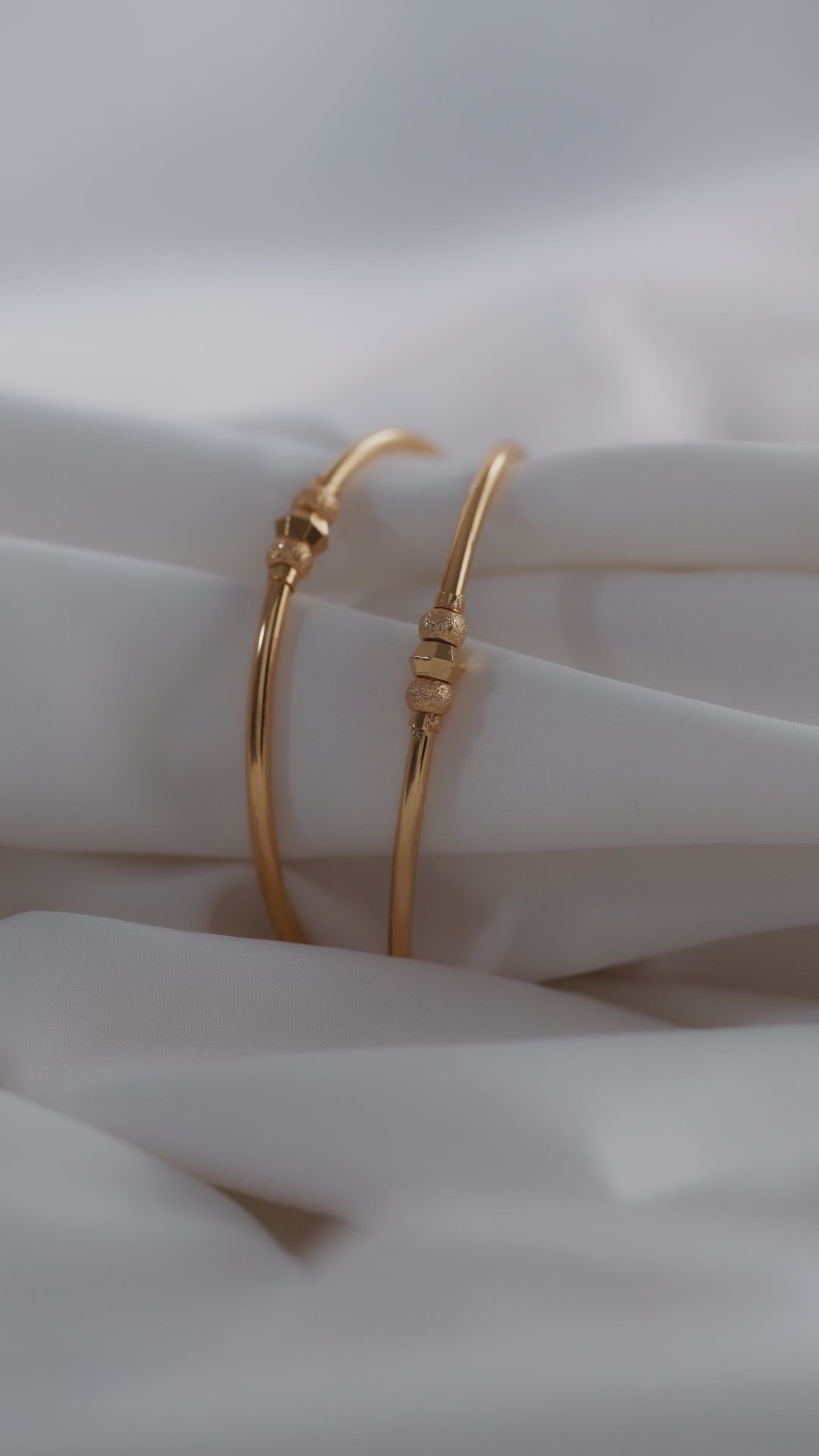 Timeless Radiance: Gold-Plated Slim Beaded Bangles (Set of 2)